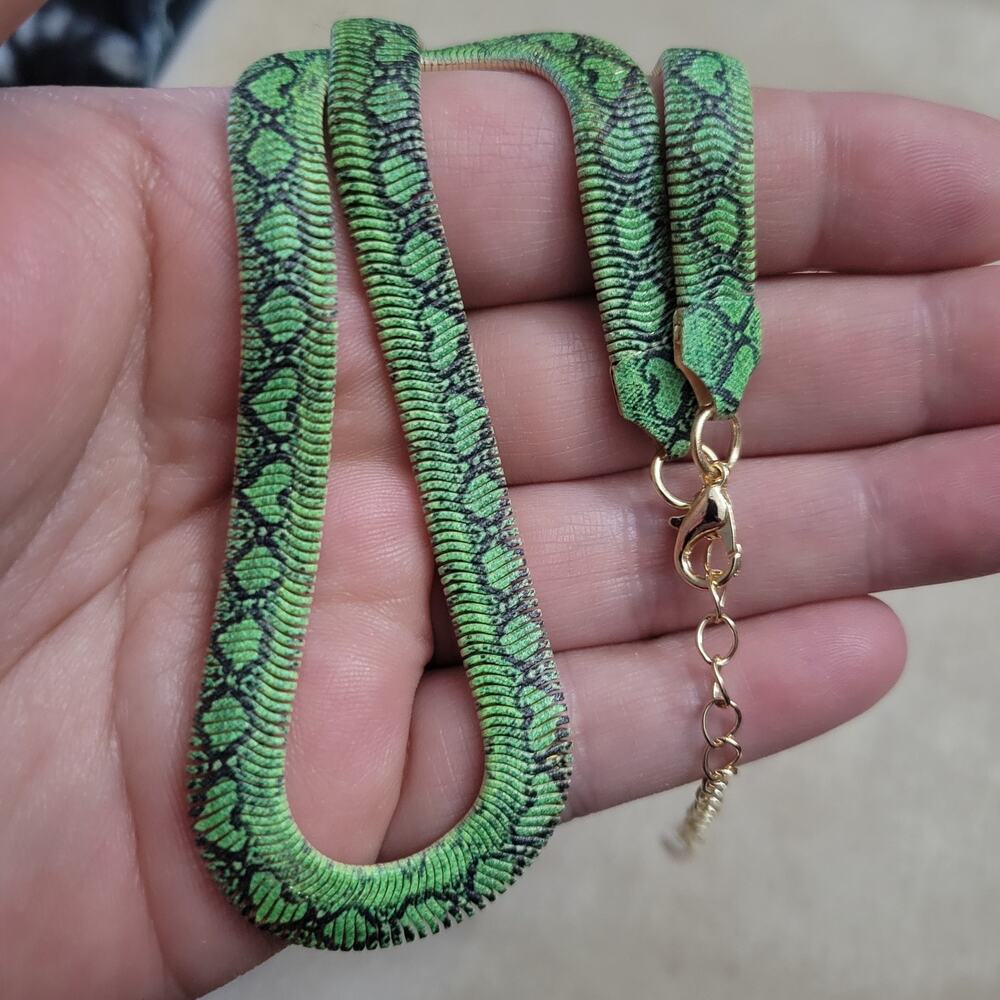 Green python print gold tone snake chain necklace